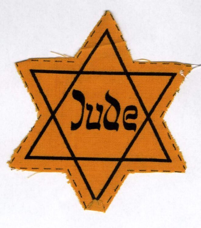 Yellow star, worn in Austriaa by a Jew in World War II.