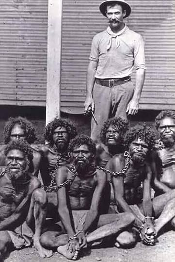 Aborigines in chains at the feet of a white man