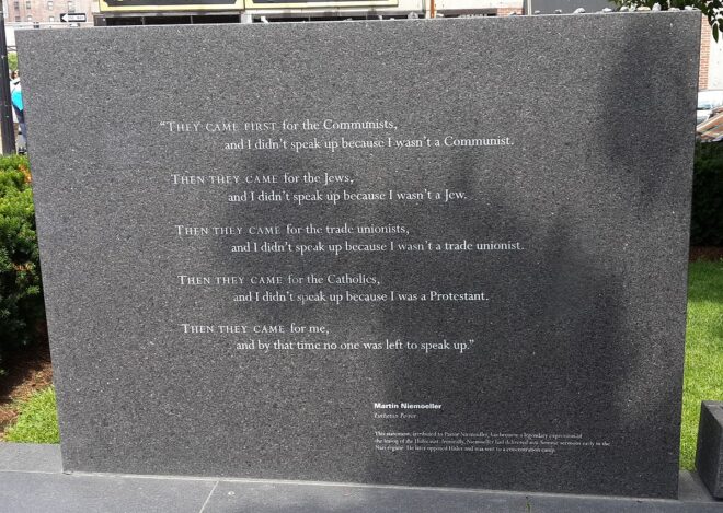 Granite plaque with poem. It reads, "They came first for the Communists, and I didn't speak because I wasn't Communist. Then they came for the Jews, and I didn't speak because I wasn't a Jew. Then they came for the trade unionists, and I didn't speak up because I wasn't a trade unionist. Then they came for the Catholics, and I didn't speak up because I was a Protestant. Then they came for me, and by that time no one was left to speak up." Martin Neimoller, Lutheran Pastor.