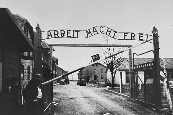 The entrance gate to Auschwitz. Above the gate in wrought iron in German are the words, "Work makes one free."