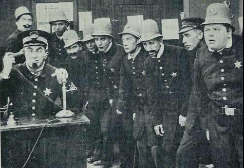 Black and white photograph of questionably motivated police circa 1920s.