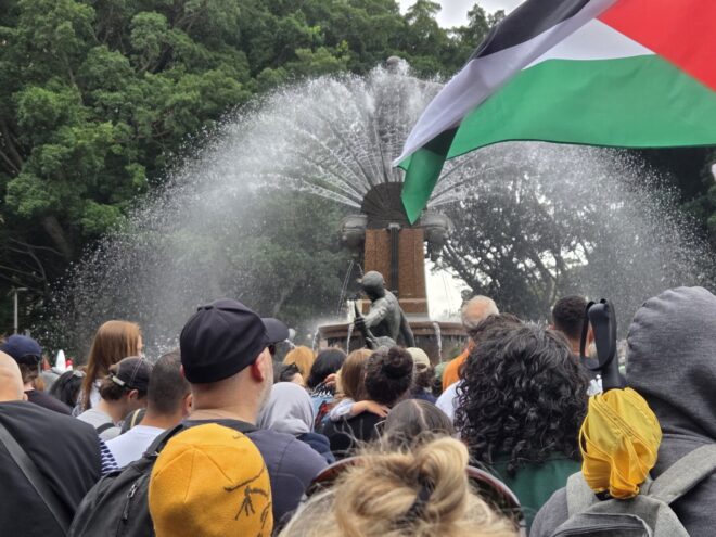 The Archibald Fountain with a Palestine flag waving.