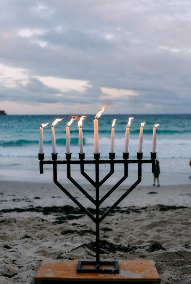 Menorah in front of the sea