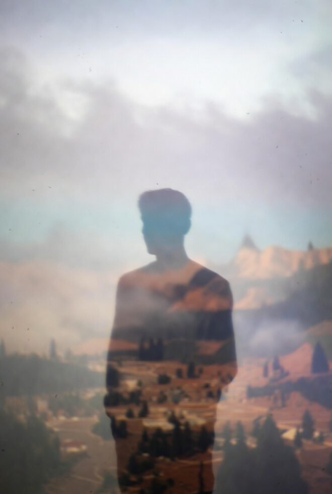 Shadow of a person over a city.