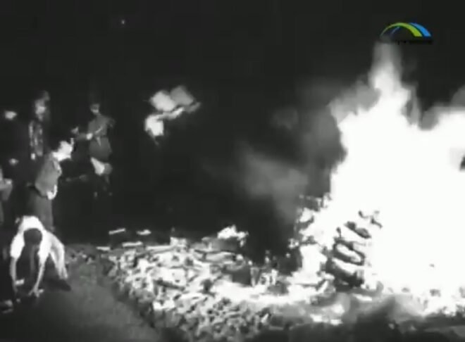 Book burning in Germany, resulting in limitation of reading material.