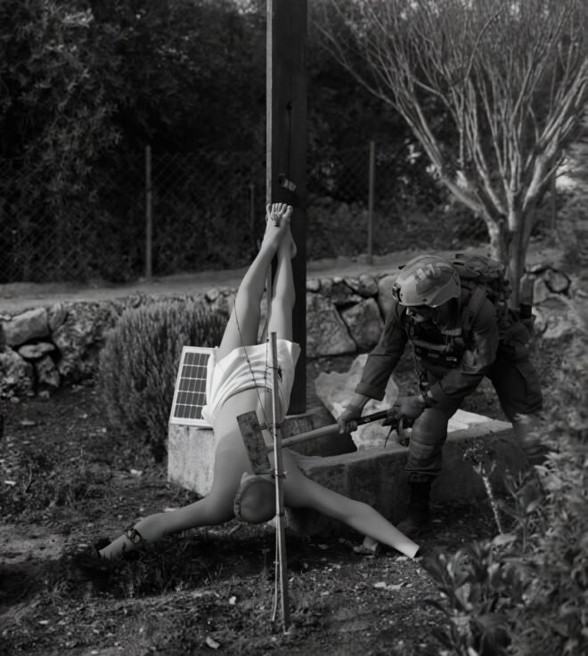 IDF soldier destroying crucifix in Lebanon during the conflict with Israel, April 2026.